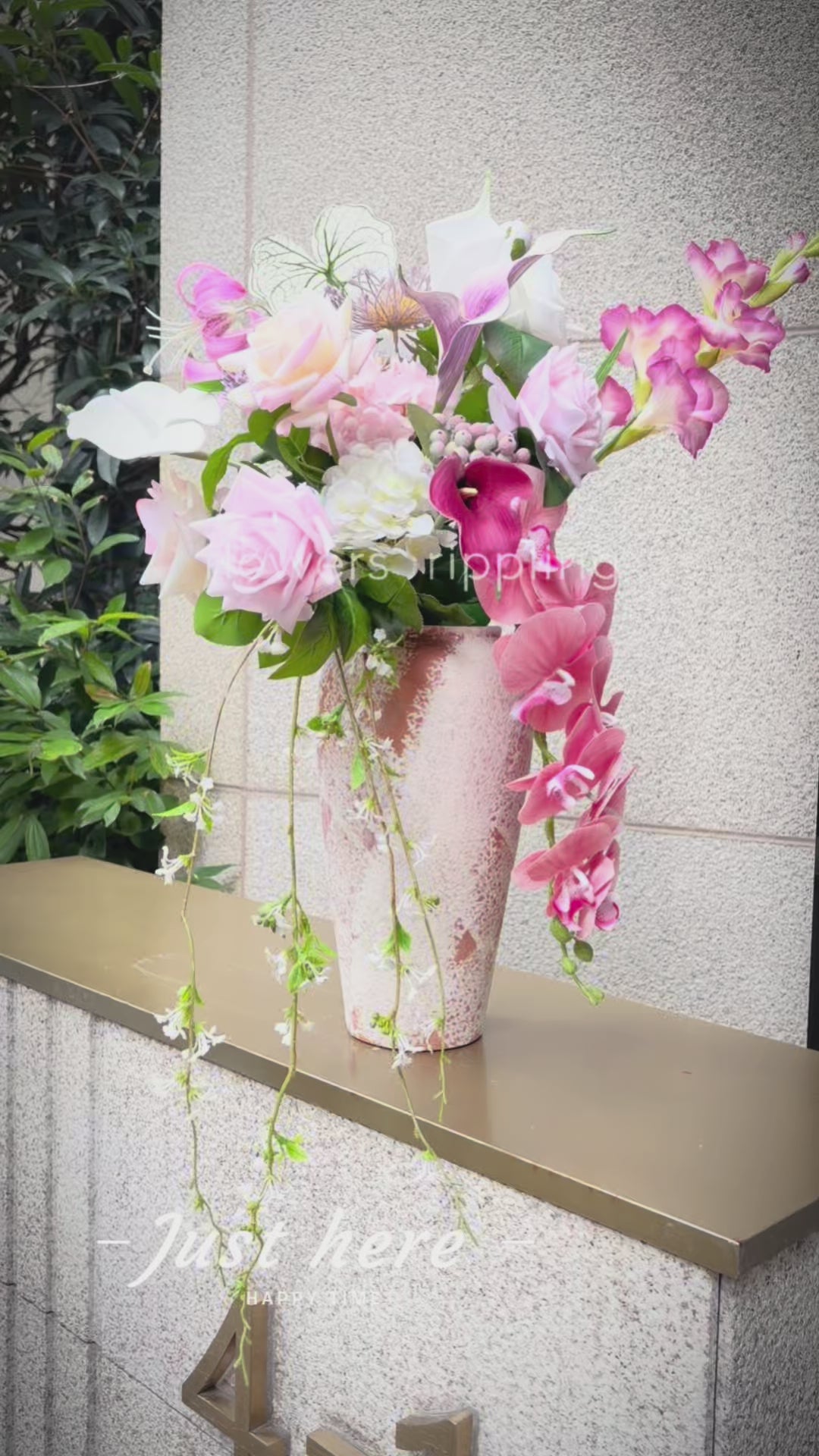 Original design of simulated pink and multi-color vase floral art (excluding vases)